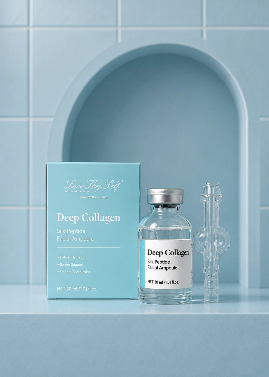 Deep Collagen facial ampoule packaging with bottle and box on a blue tiled background by Lovethyself
