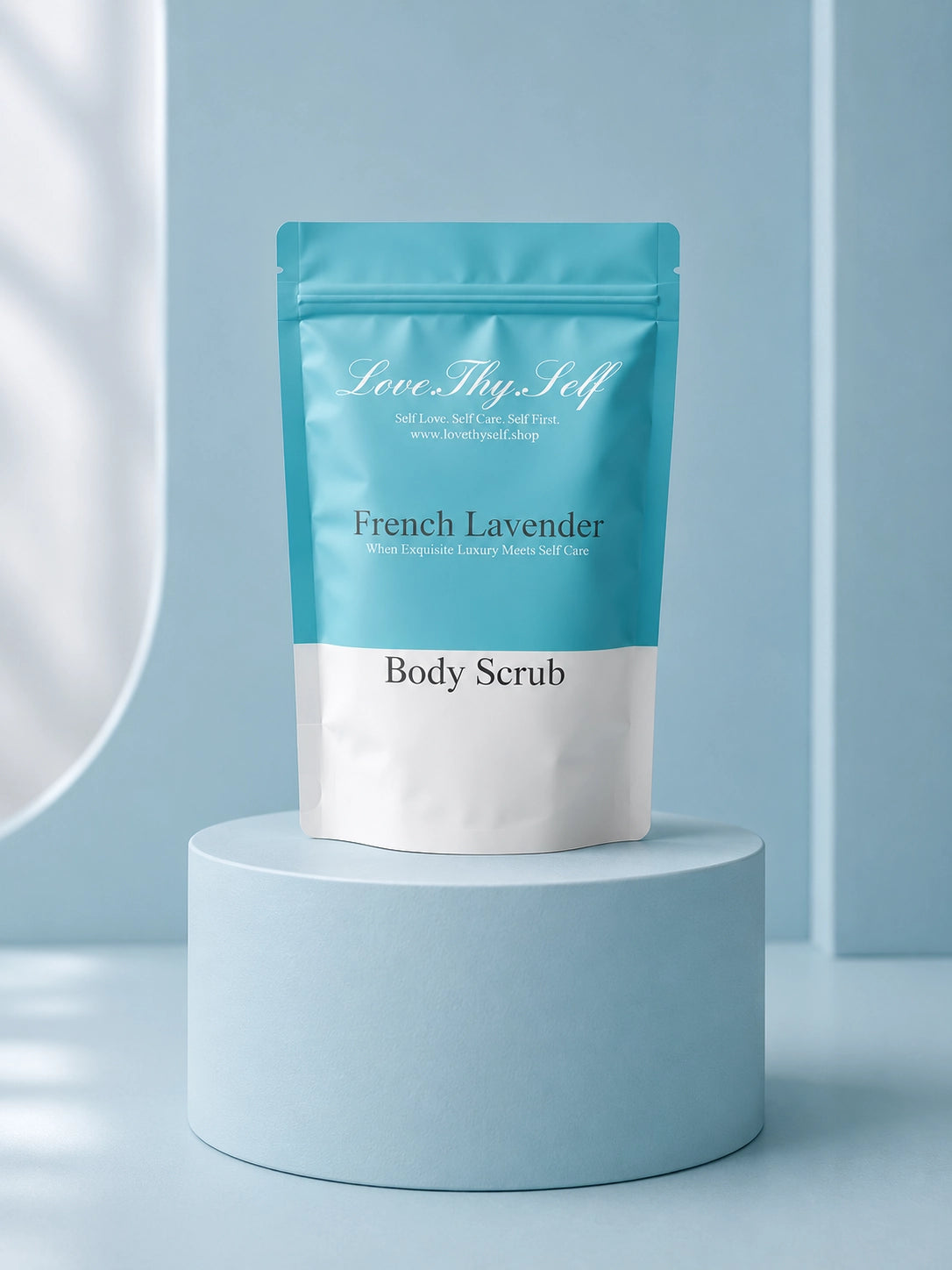 French Lavender Body Scrub by LoveThySelf displayed on a light blue pedestal