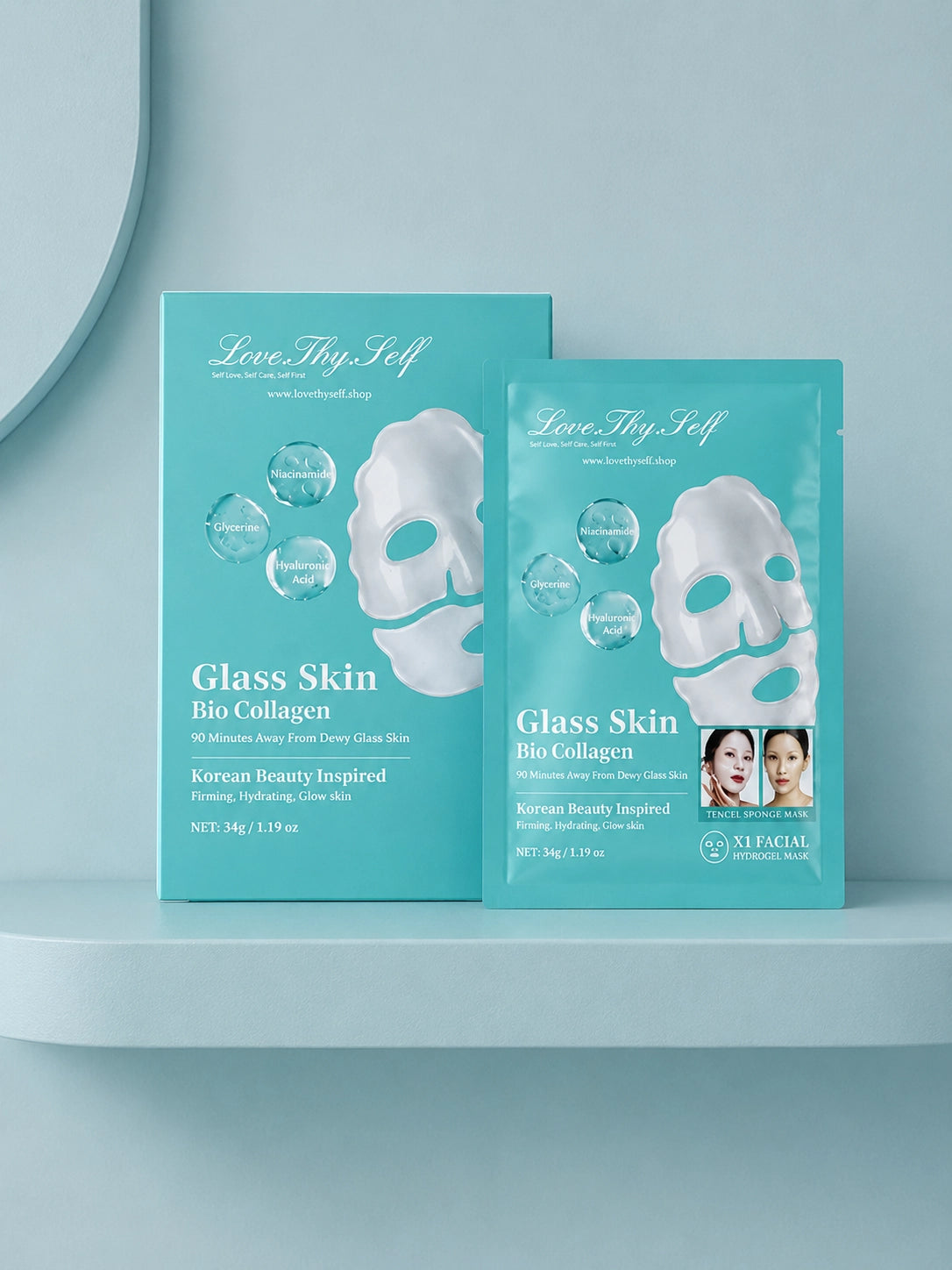 Two Glass Skin Bio Collagen Hydrogel Mask packages by LoveThySelf on a light blue shelf