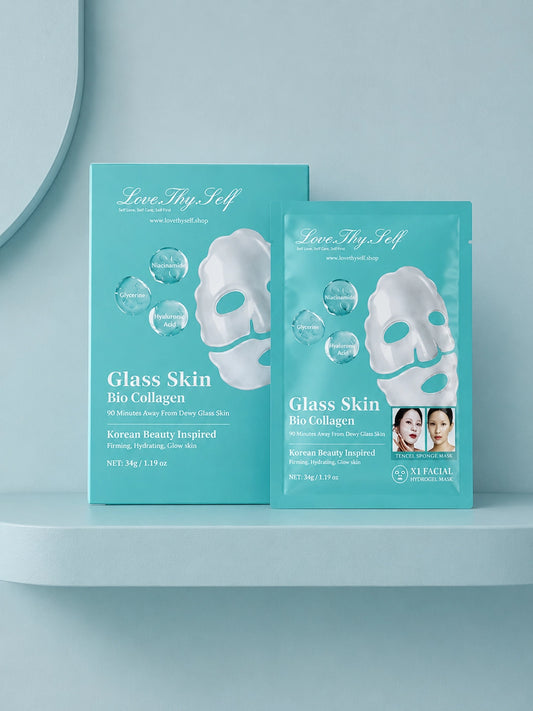 Two Glass Skin Bio Collagen Hydrogel Mask packages by LoveThySelf on a light blue shelf