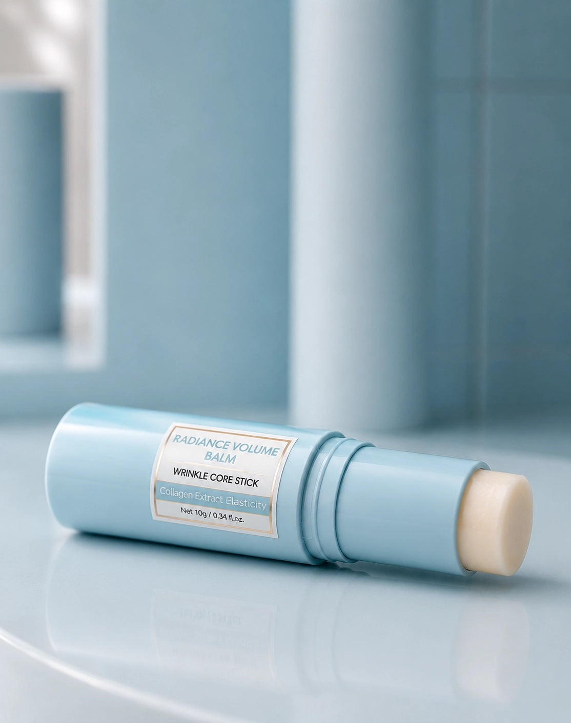 Blue radiance volume balm stick on a light blue surface with a blurred background